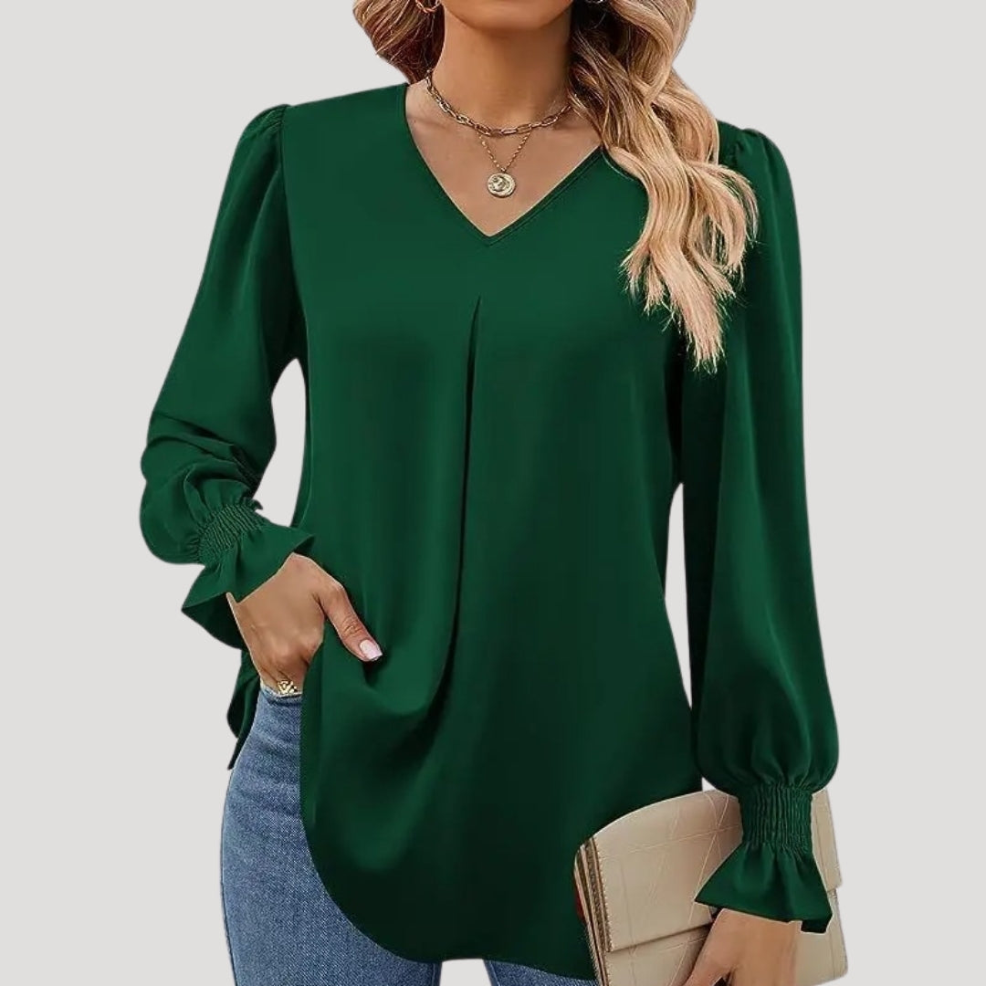 Blusa con cuello en V y mangas largas abullonadas: estilo elegante para la oficina. 0