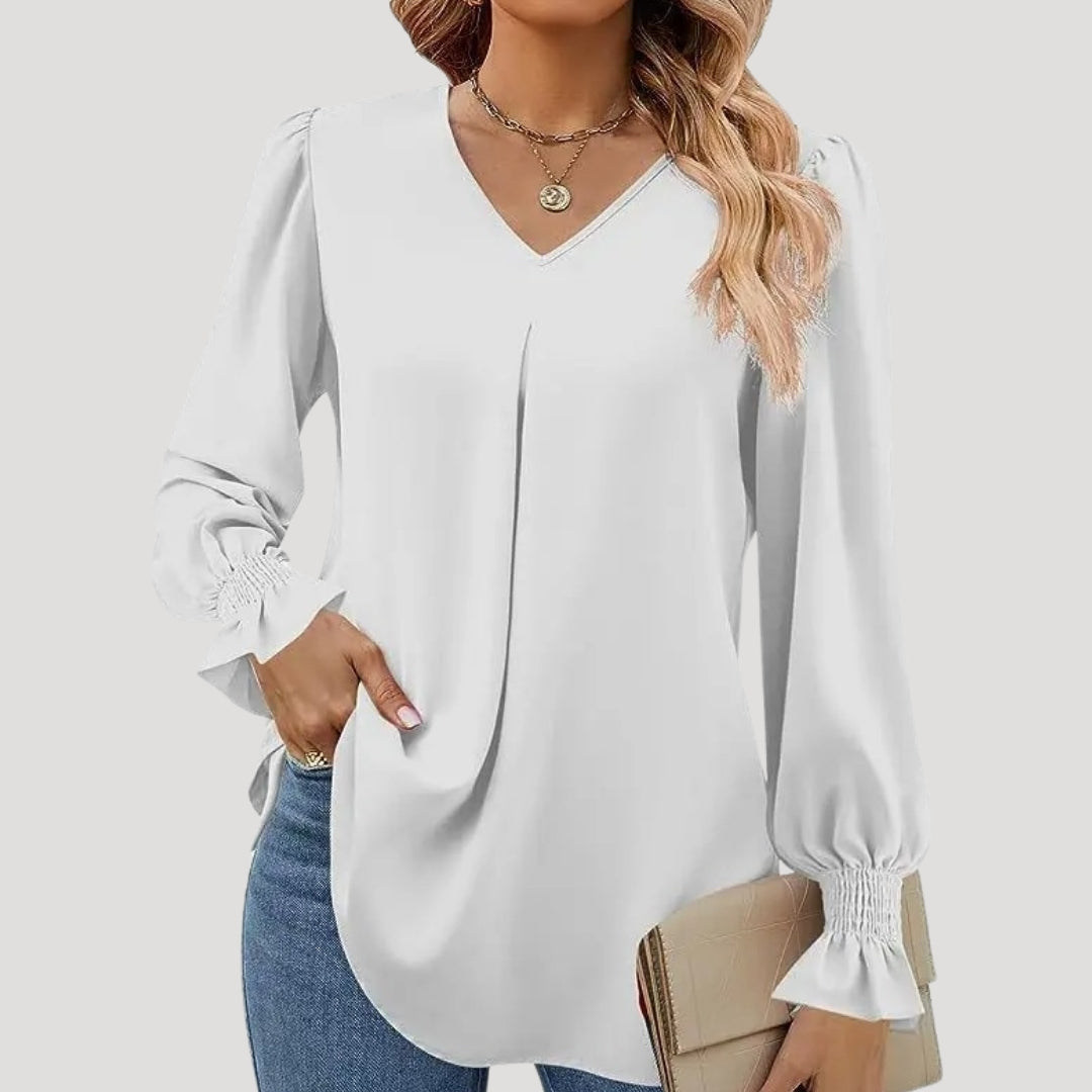 Blusa con cuello en V y mangas largas abullonadas: estilo elegante para la oficina. 11
