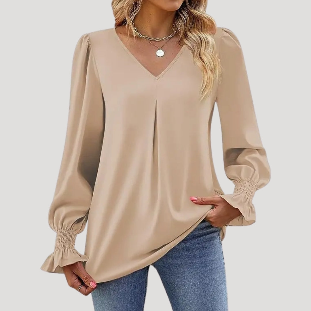 Blusa con cuello en V y mangas largas abullonadas: estilo elegante para la oficina. 12