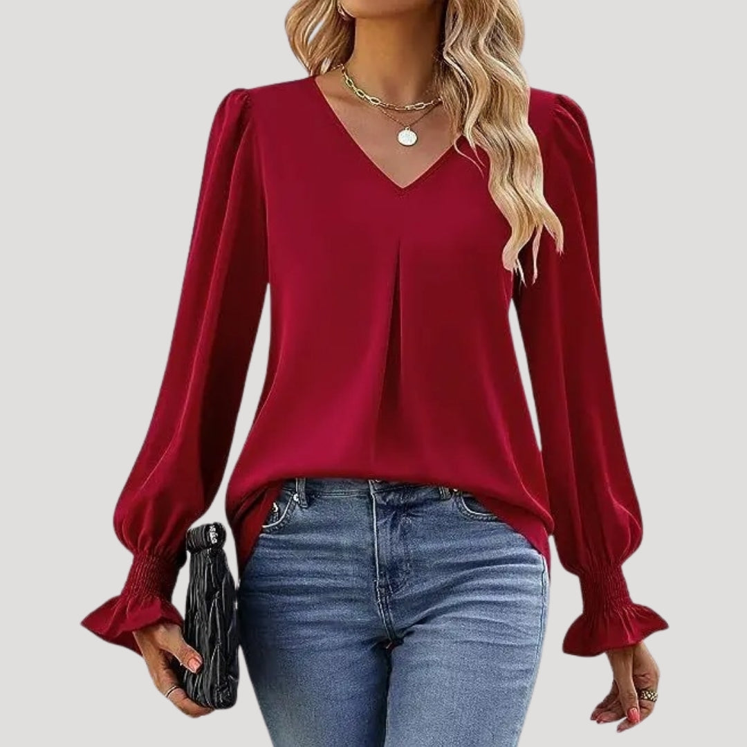 Blusa con cuello en V y mangas largas abullonadas: estilo elegante para la oficina. 16