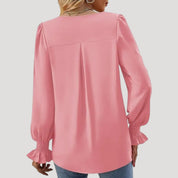 Blusa con cuello en V y mangas largas abullonadas: estilo elegante para la oficina. 5
