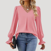 Blusa con cuello en V y mangas largas abullonadas: estilo elegante para la oficina. 6