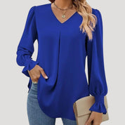 Blusa con cuello en V y mangas largas abullonadas: estilo elegante para la oficina. 8