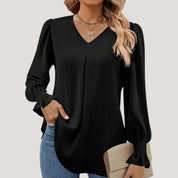 Blusa con cuello en V y mangas largas abullonadas: estilo elegante para la oficina. 9
