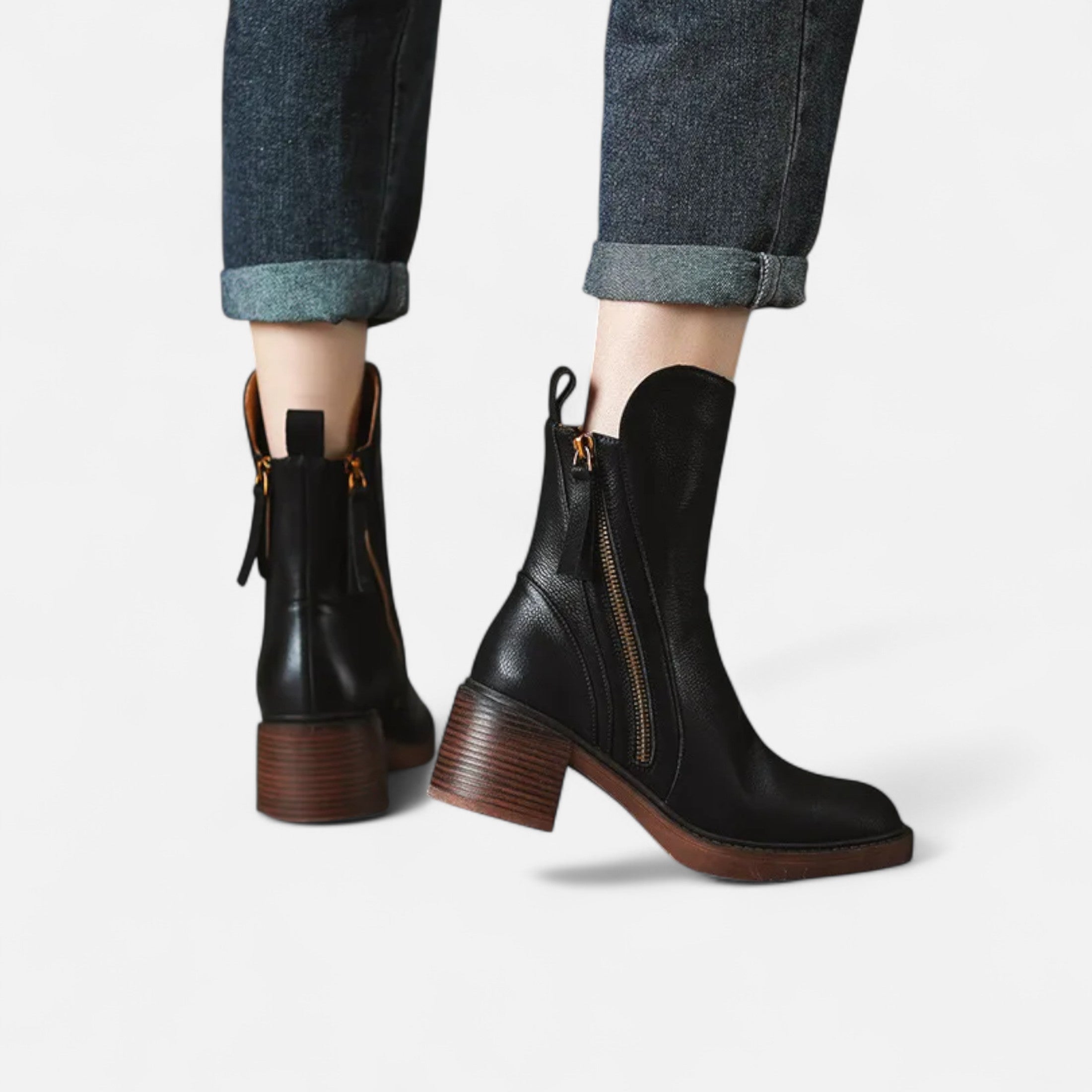 Botines negros con cremallera: calzado elegante de invierno 3