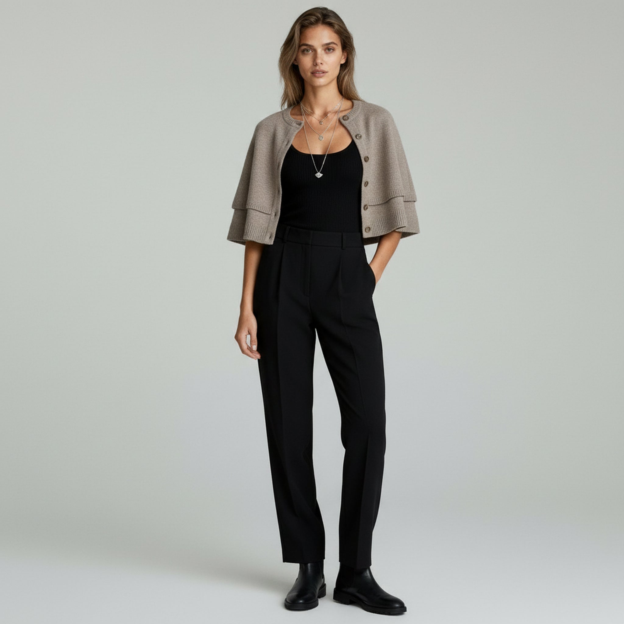 Chaqueta de mujer con diseño de capa de punto 1