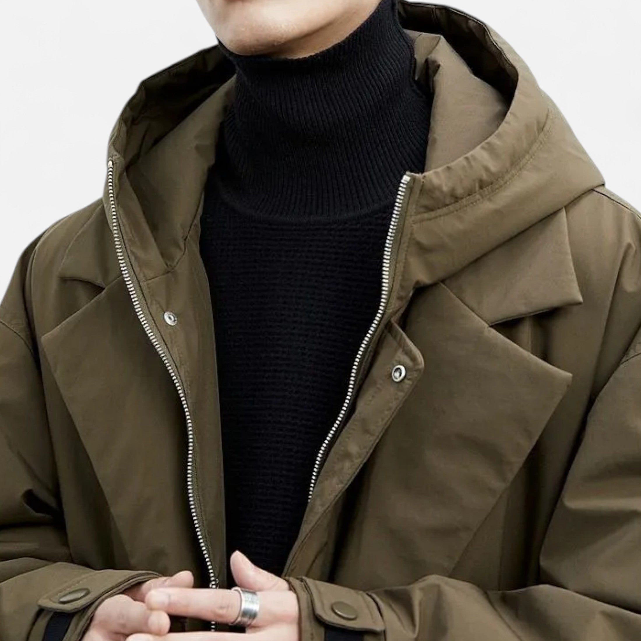 Chaqueta impermeable larga con capucha: prenda esencial y elegante para el invierno. 3