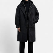 Chaqueta impermeable larga con capucha: prenda esencial y elegante para el invierno. 5