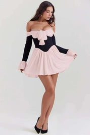 Minivestido con detalle de lazo en los hombros – Look romántico para cóctel 1