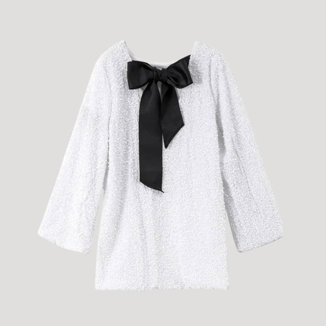 Minivestido de lentejuelas con detalle de lazo de satén: ¡una declaración de estilo para fiestas glamurosas! 0