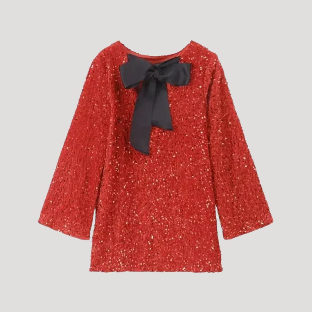 Minivestido de lentejuelas con detalle de lazo de satén: ¡una declaración de estilo para fiestas glamurosas! 10