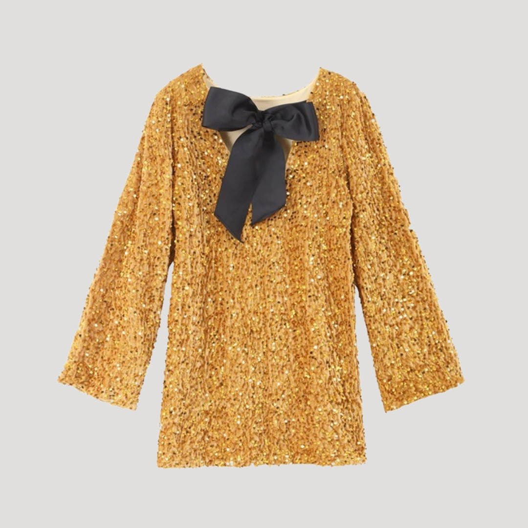 Minivestido de lentejuelas con detalle de lazo de satén: ¡una declaración de estilo para fiestas glamurosas! 7