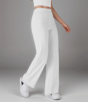 Pantalones de cintura alta con botones delanteros en rosa suave. Estilo casual. 1