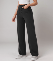 Pantalones de cintura alta con botones delanteros en rosa suave. Estilo casual. 7
