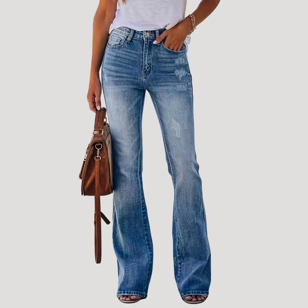 Vaqueros acampanados con detalle desgastado, estilo retro chic 0