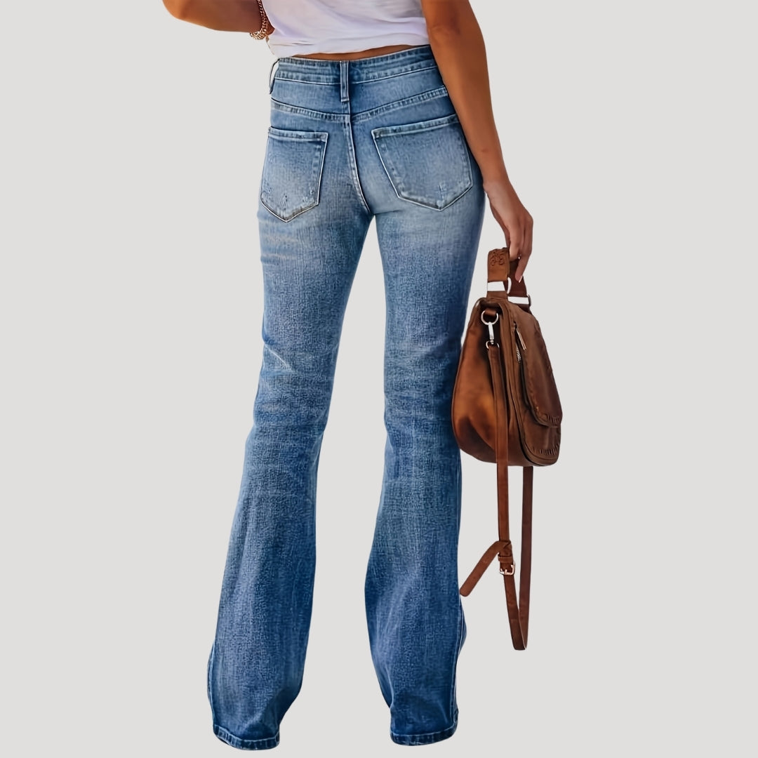 Vaqueros acampanados con detalle desgastado, estilo retro chic 2