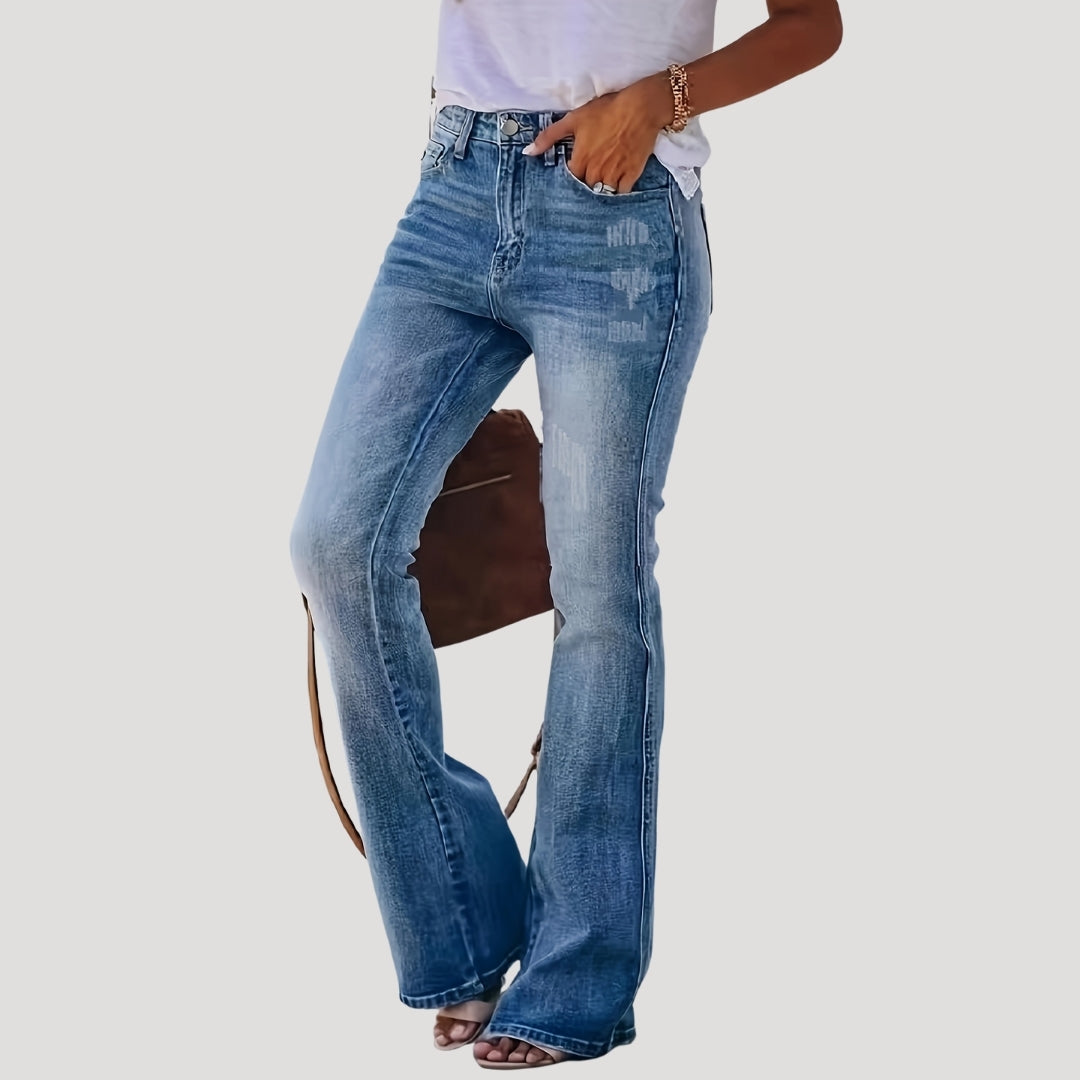 Vaqueros acampanados con detalle desgastado, estilo retro chic 3