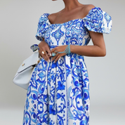 Vestido largo con hombros descubiertos y mangas abullonadas: un estilo veraniego sin esfuerzo 5