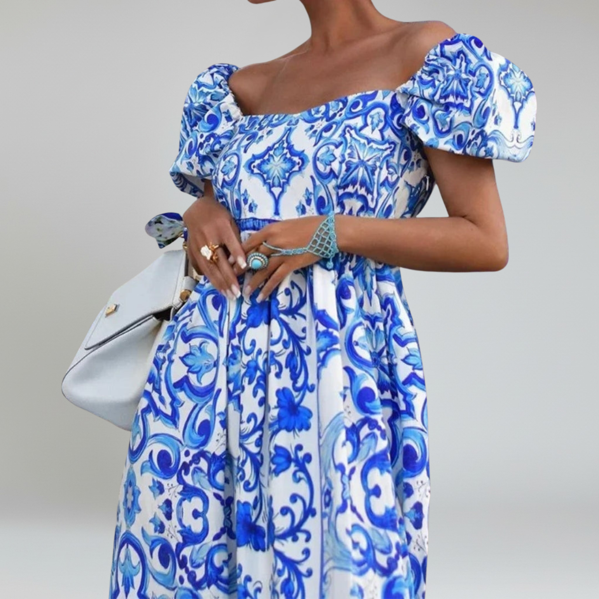 Vestido largo con hombros descubiertos y mangas abullonadas: un estilo veraniego sin esfuerzo 5